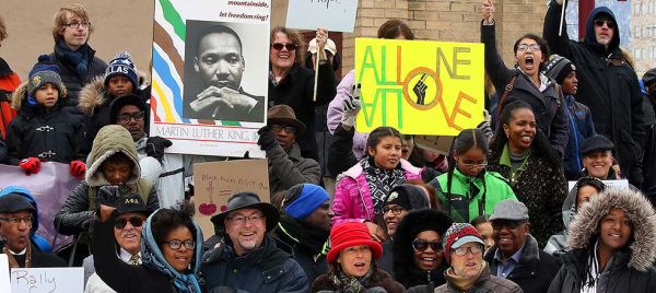 Photo of a gathering of people on Martin Luther King Jr. Day``````````````````