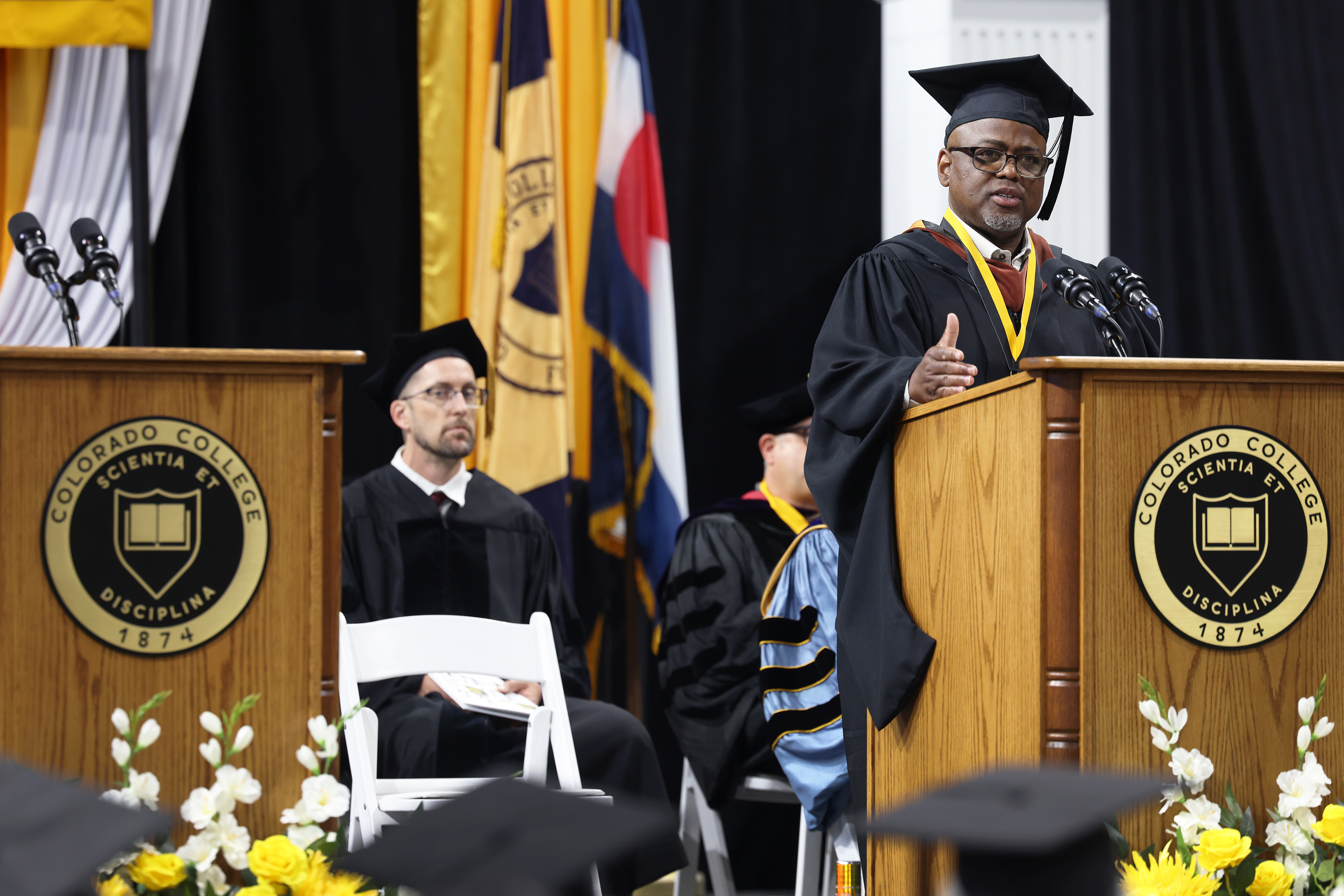 Board of Trustees Chair Kyle Samuel '92 addresses the graduates, faculty, staff, and families in attendance at Commencement 2026. Photo by Jamie Cotten / Colorado College