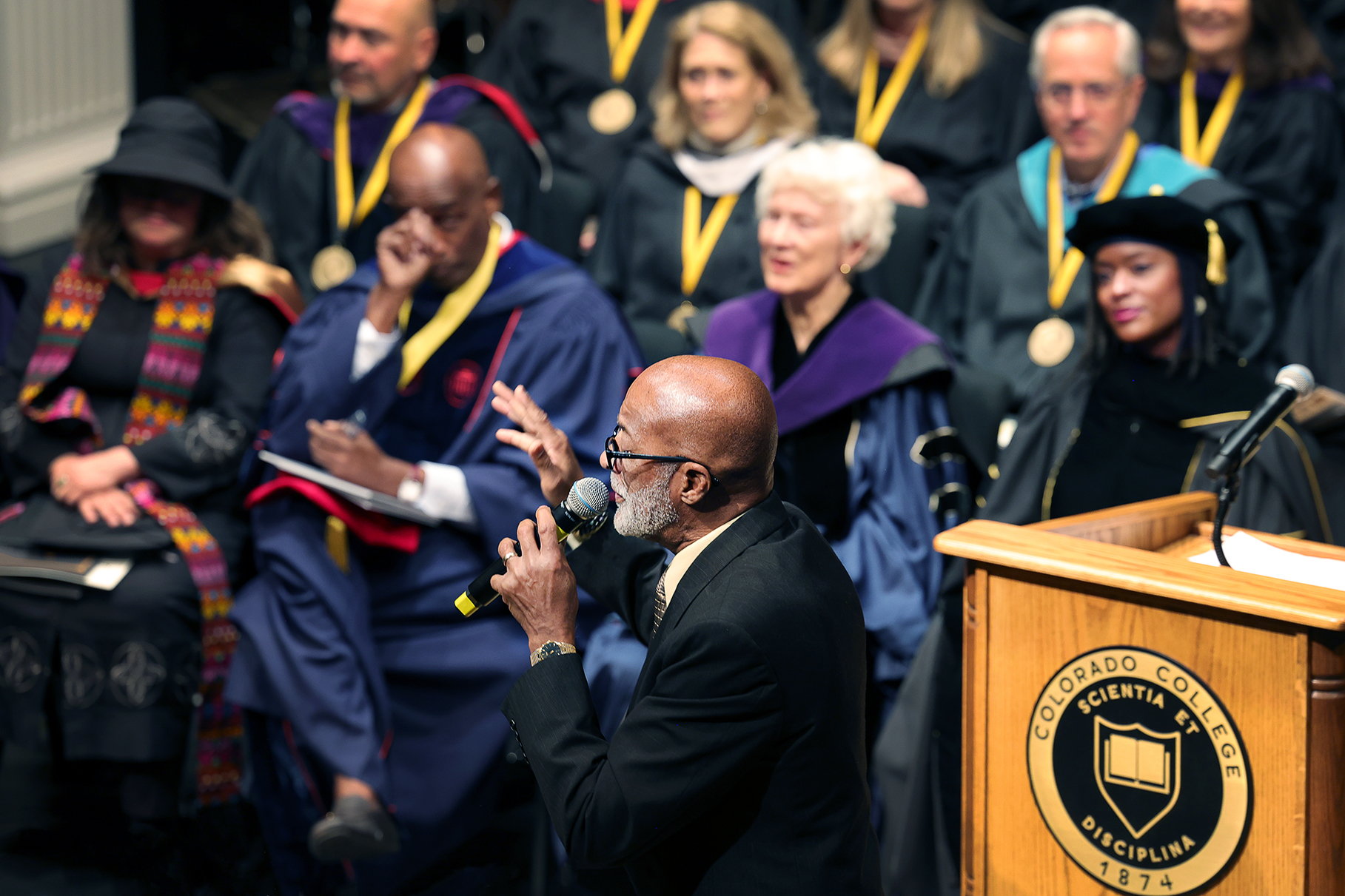 President Manya Whitaker's father, Morris Whitaker, sings "Never Would've Made it" by Marvin Sapp, as a tribute to Whitaker's supporters and the college community members whom she says created opportunities for her in her administrative journey. Photo by Jamie Cotten / Colorado College