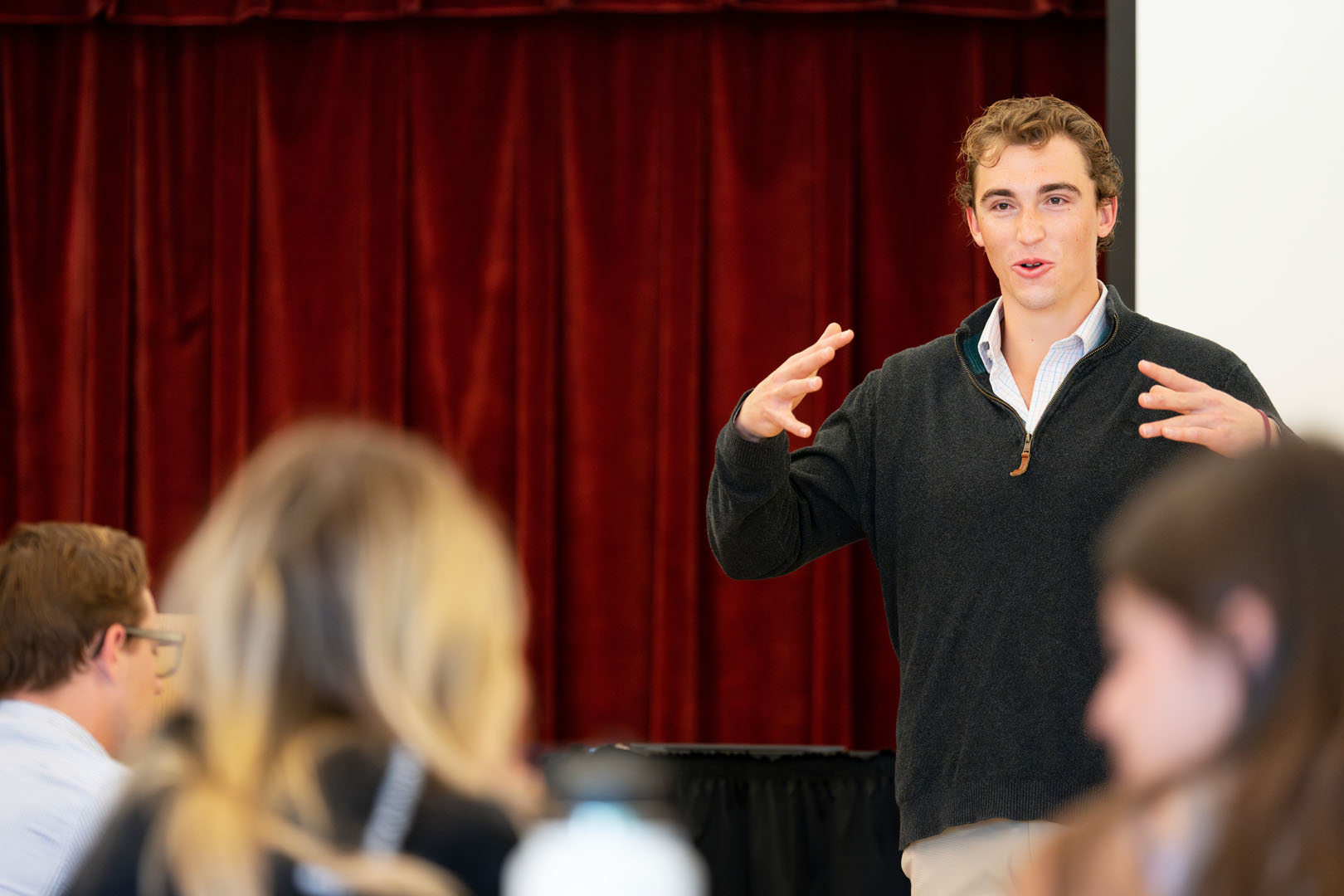 Hunton Russell ’23 presents during Mike Edmonds's BU116 Business Communications Block 8 class on May 17, 2023. Photo by Lonnie Timmons III / Colorado College.