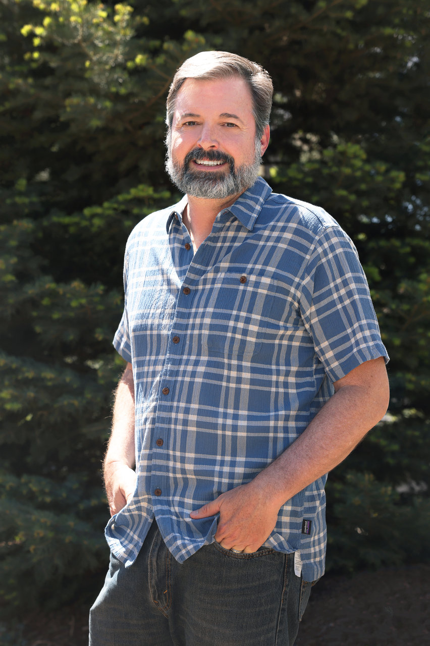 Portrait of Dr. Chris Burnett, Director of Outdoor Education