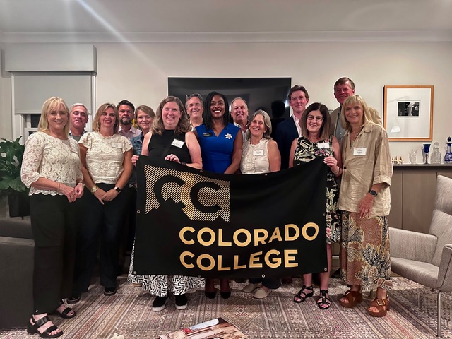 Interim President Manya Whitaker posing with Chicago alumni and parents.