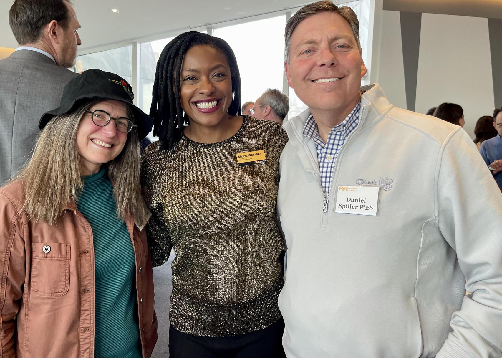 Manya with two alumni from CC