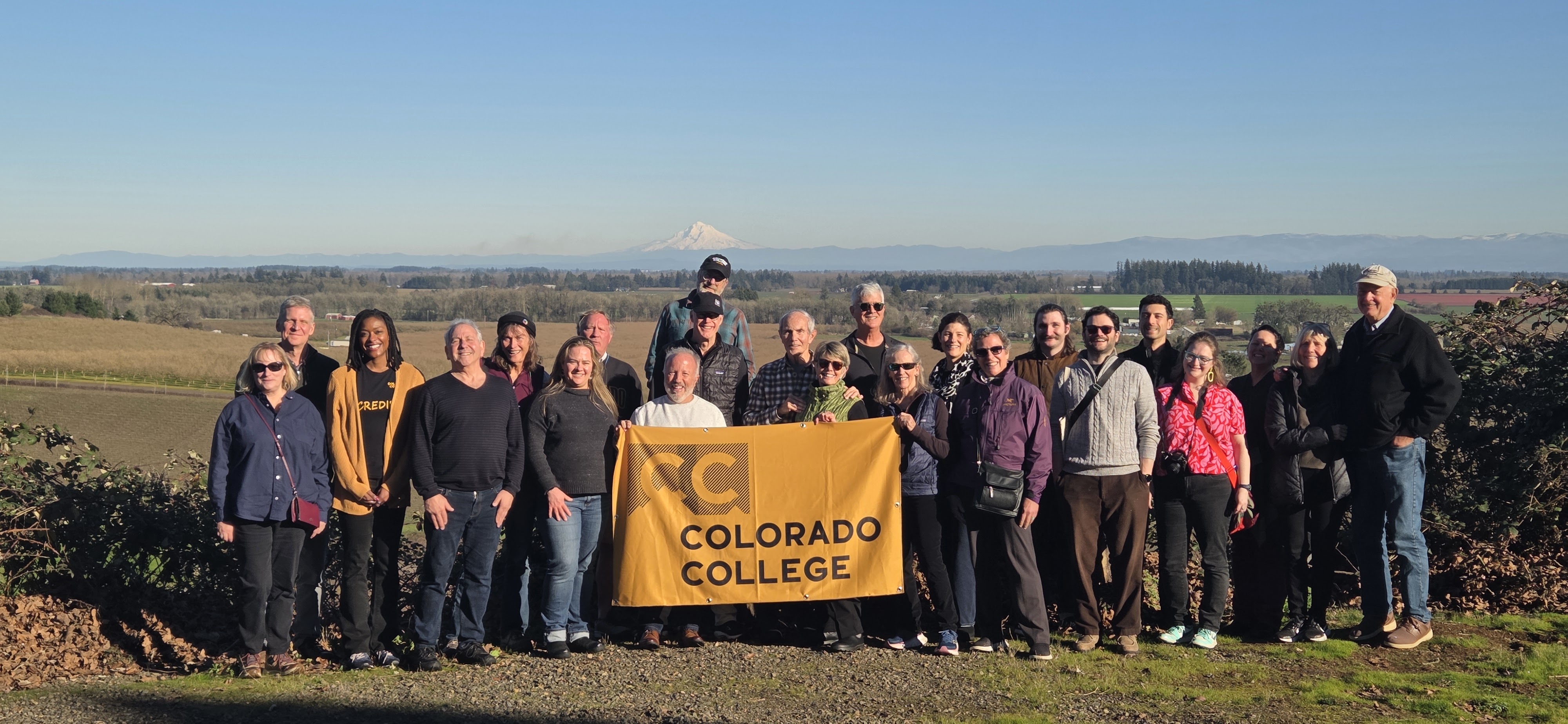 Manya with alumni in Portland.