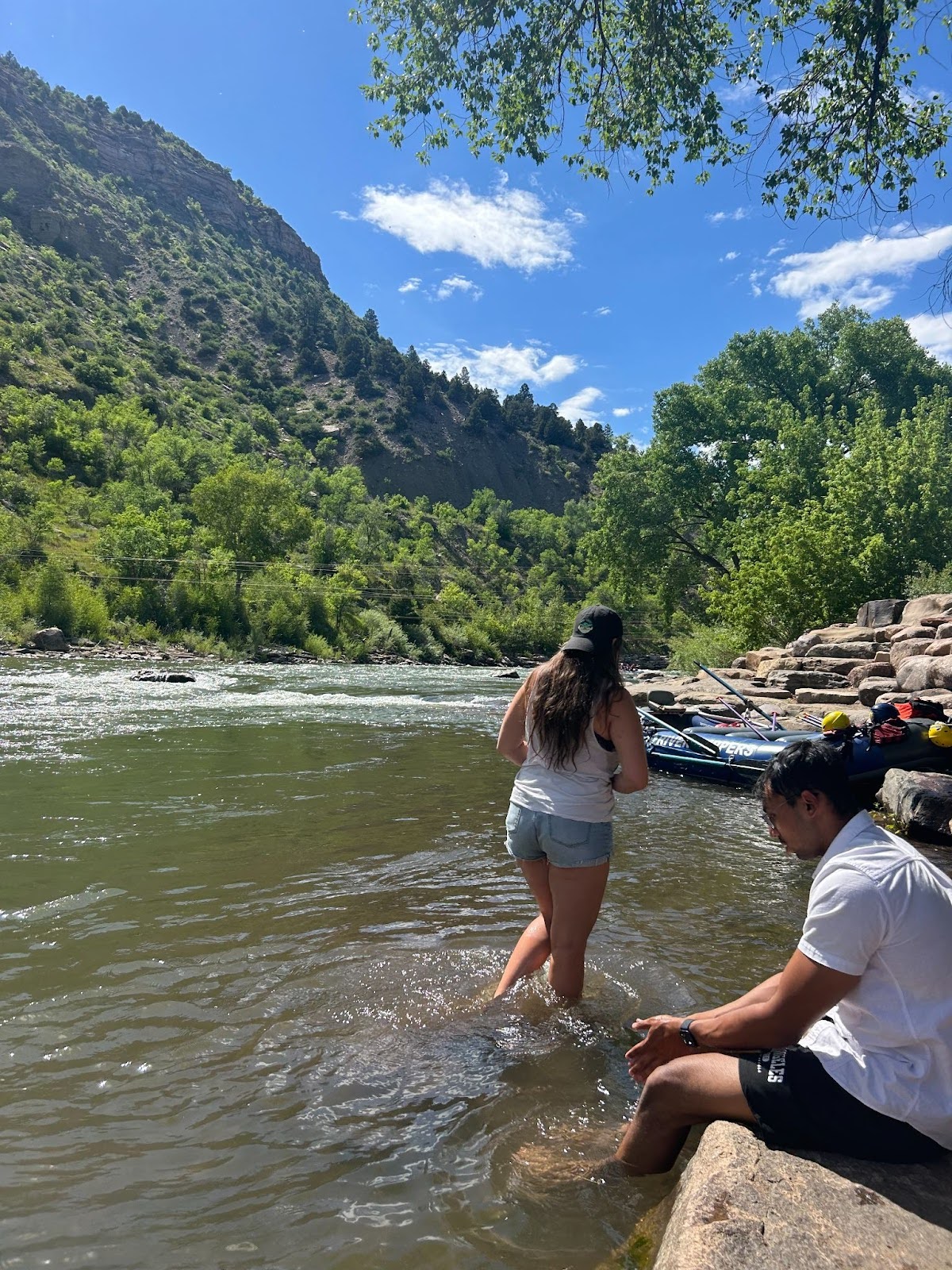 Natasha and Mustafa wading in the Animas River near Durango, CO, on a research trip. Photo by Alice O’Neal-Freeman